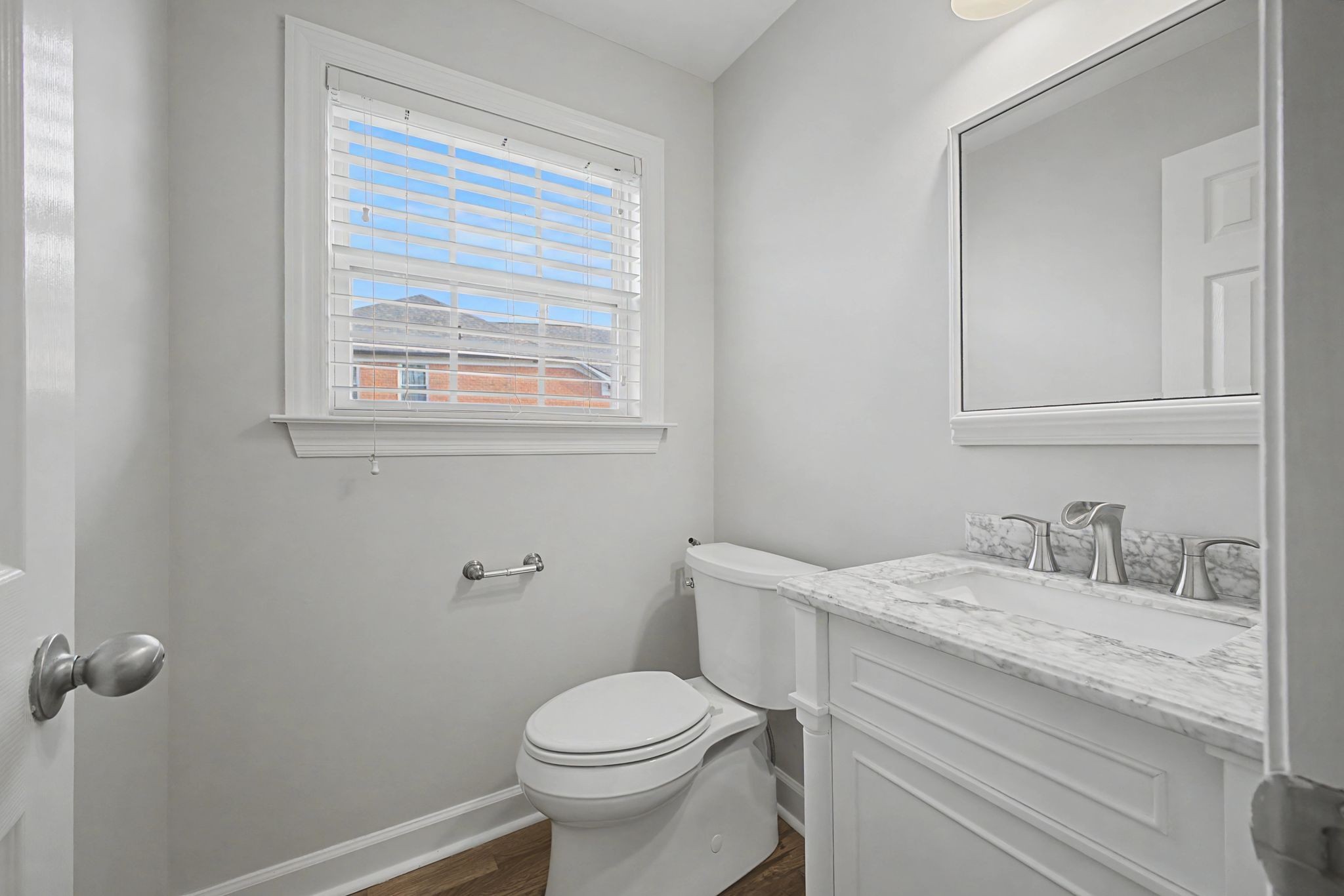 1060 Auldridge Drive Spring Hill, TN 37174 - Photo 14 of 49 a bathroom with a granite countertop toilet sink and mirror