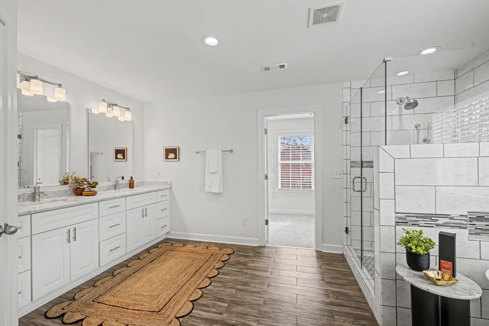 1060 Auldridge Drive Spring Hill, TN 37174 - Photo 20 of 49 a spacious bathroom with double vanity and a shower