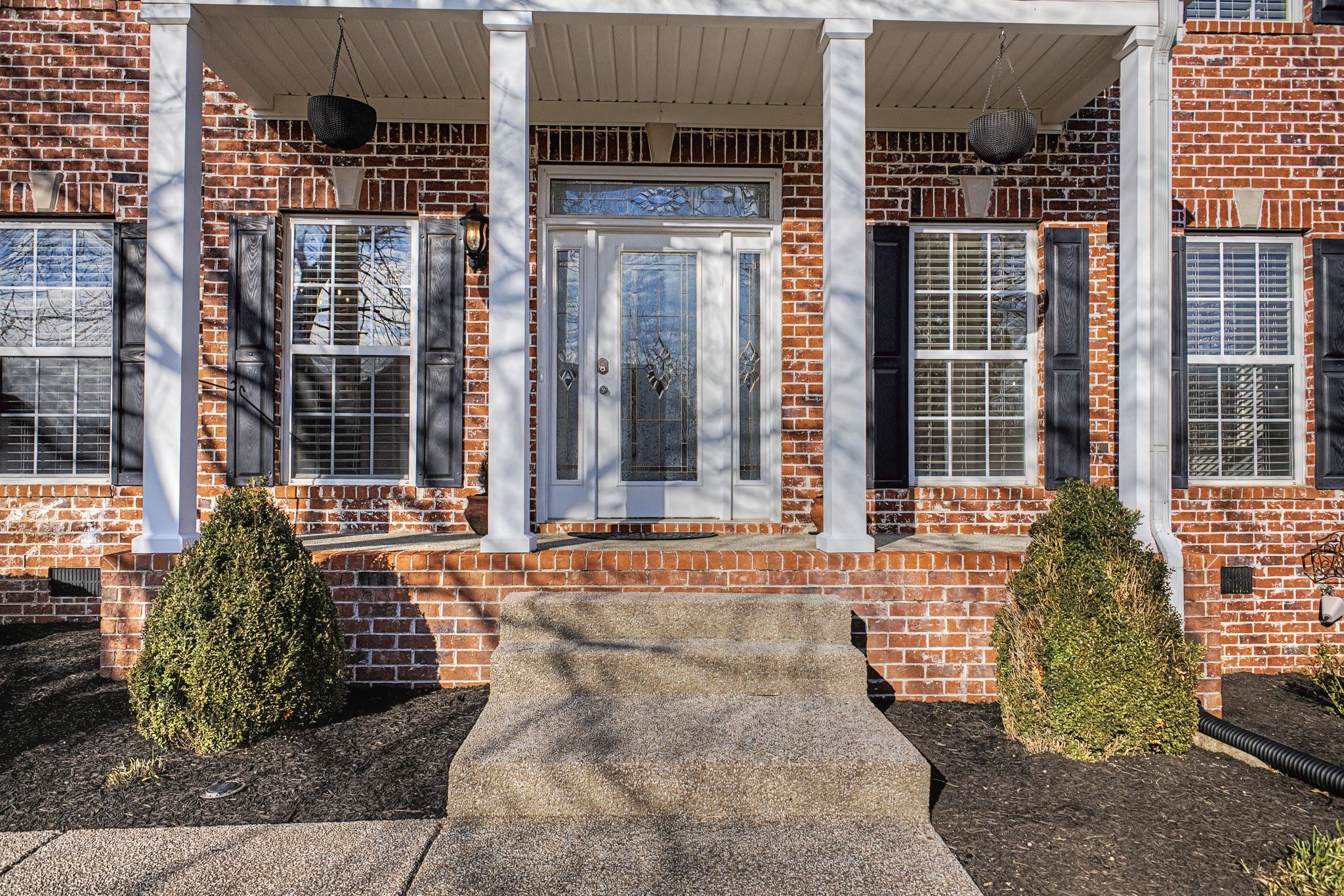 1060 Auldridge Drive Spring Hill, TN 37174 - Photo 2 of 49 front view of a house with a large window and a rug