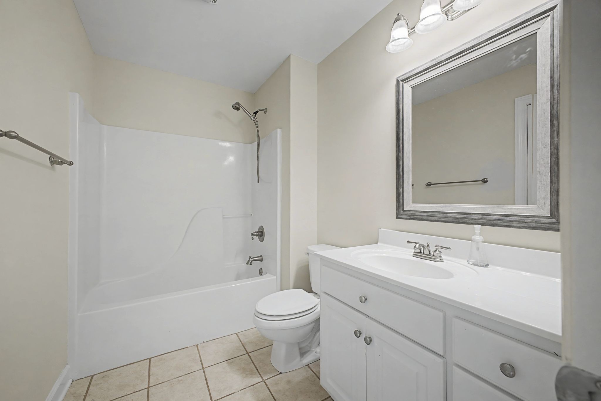 1060 Auldridge Drive Spring Hill, TN 37174 - Photo 34 of 49 a bathroom with a sink a toilet and shower