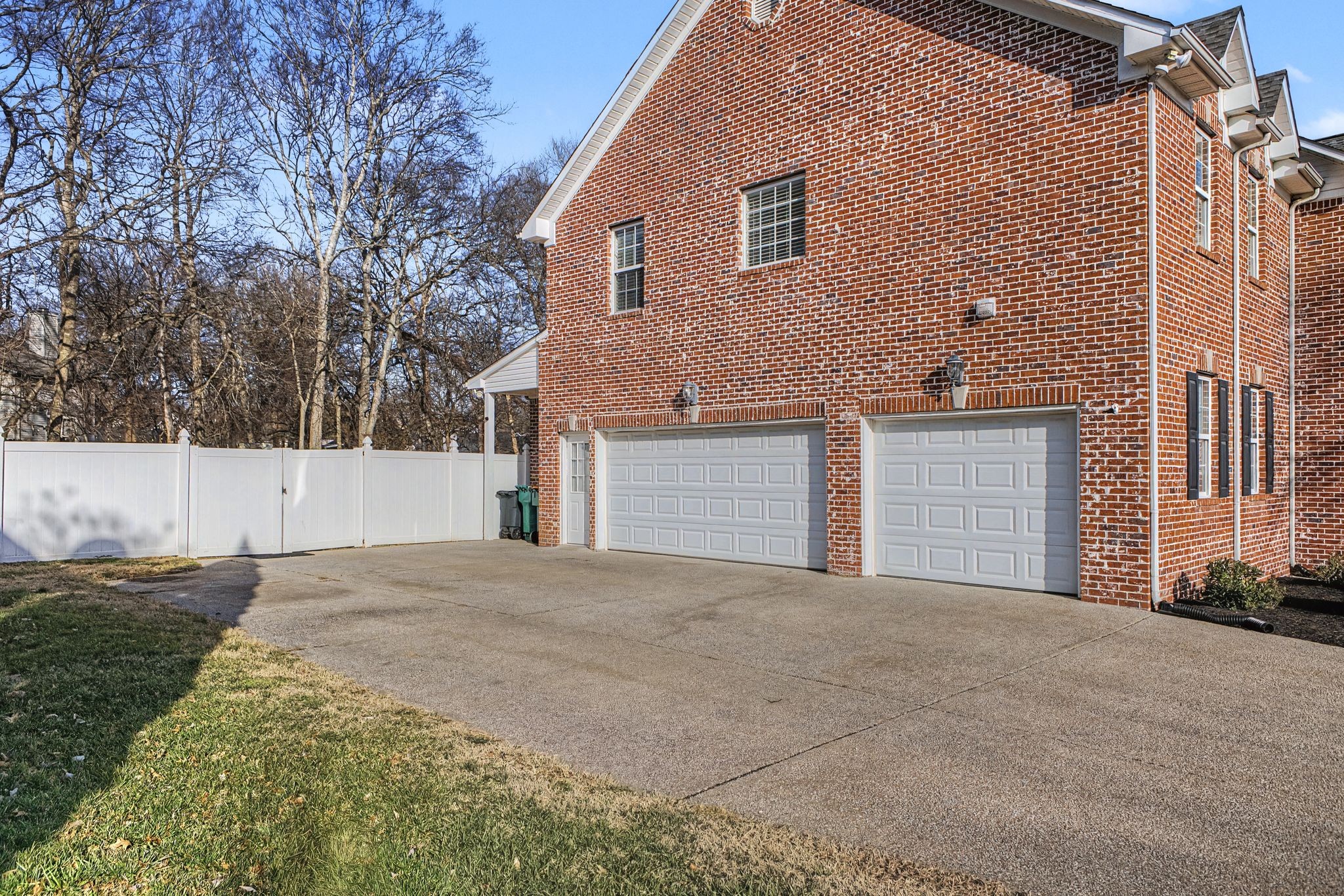 1060 Auldridge Drive Spring Hill, TN 37174 - Photo 35 of 49 a front view of a house with a yard and garage