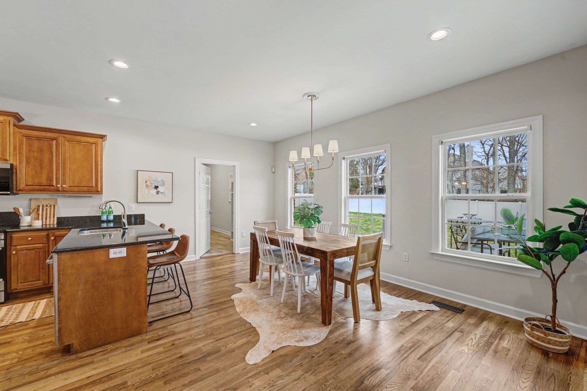 1060 Auldridge Drive Spring Hill, TN 37174 - Photo 9 of 49 a dining room with wooden floor and furniture