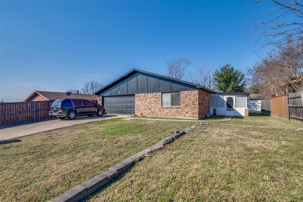 3630 Dumas Trail Garland, TX 75043 - Photo 12 of 12 a house view with a garden space