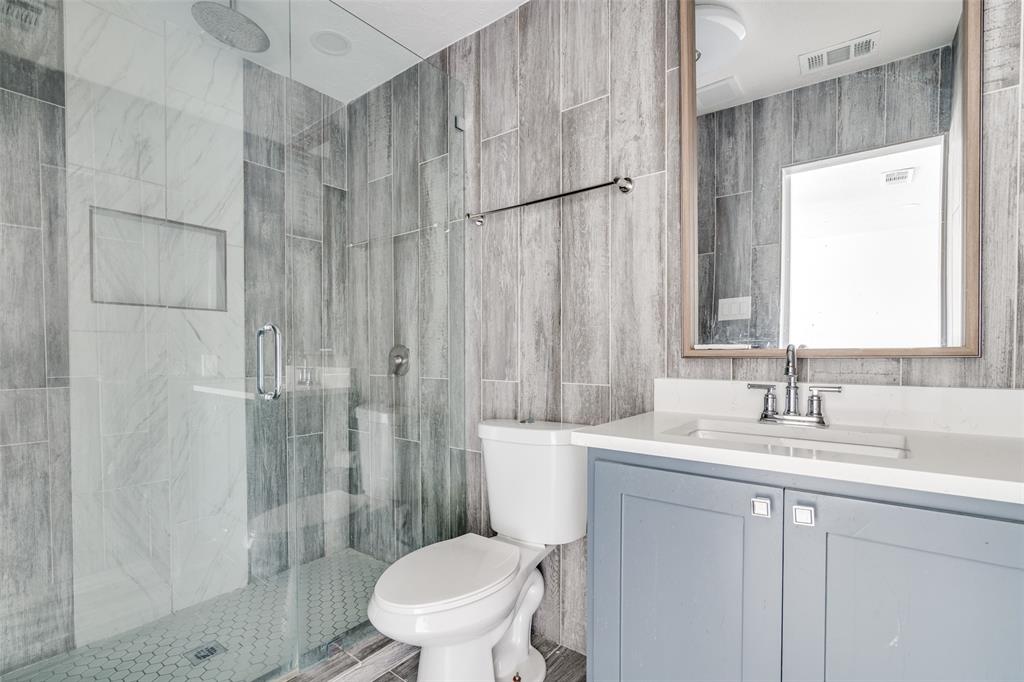 3630 Dumas Trail Garland, TX 75043 - Photo 8 of 12 a bathroom with a sink toilet and shower