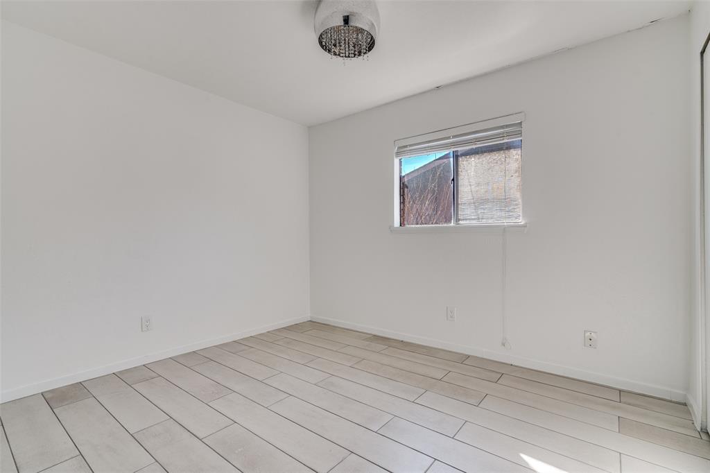 3630 Dumas Trail Garland, TX 75043 - Photo 10 of 12 an empty room with a workbench