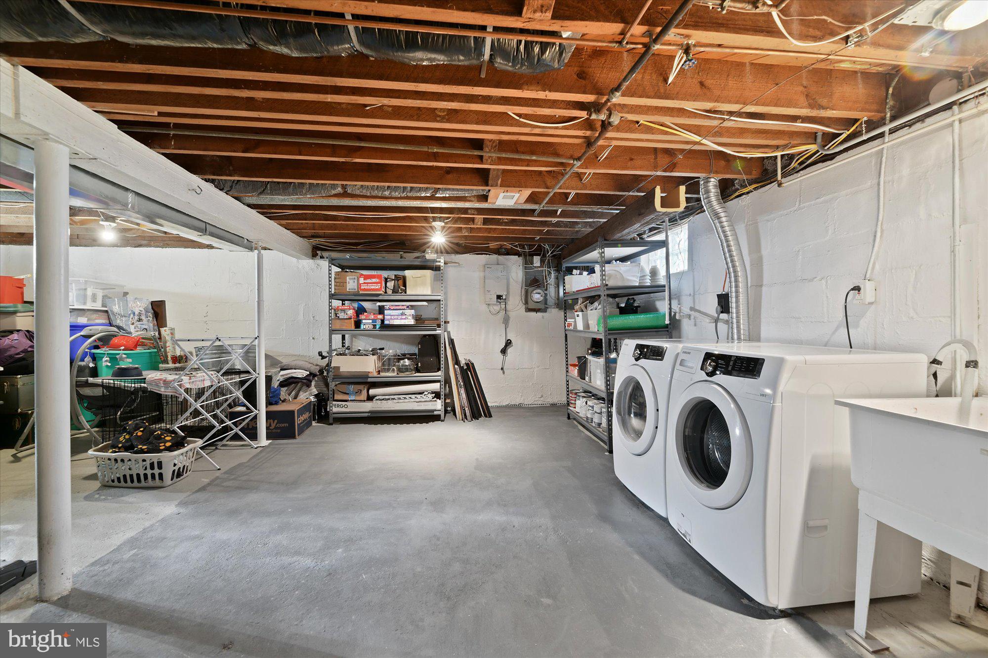 2701 Glendale Road Baltimore, MD 21234 - Photo 32 of 34 There's a huge utility room with storage & laundry