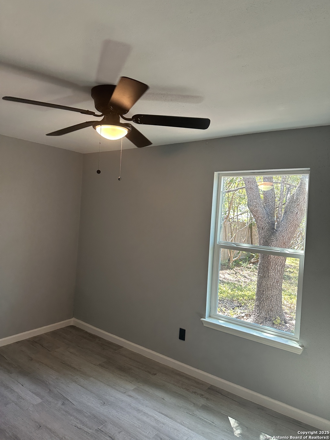 14627 Highland Ridge San Antonio, TX 78233 - Photo 15 of 25 an empty room with a window