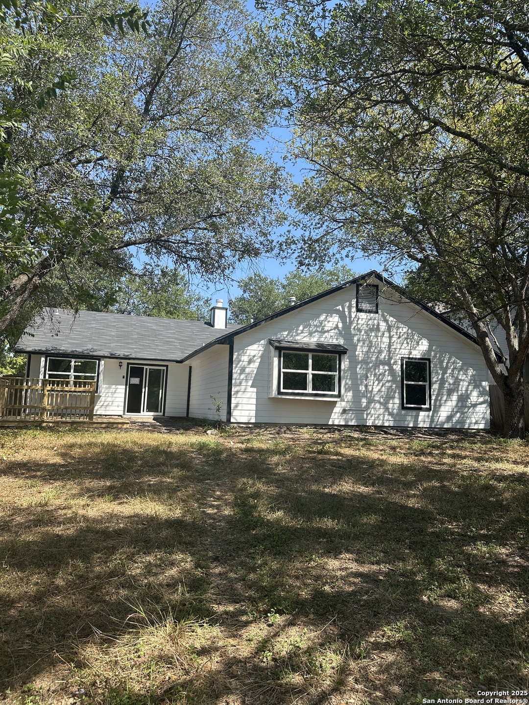 14627 Highland Ridge San Antonio, TX 78233 - Photo 23 of 25 a front view of a house with a garden