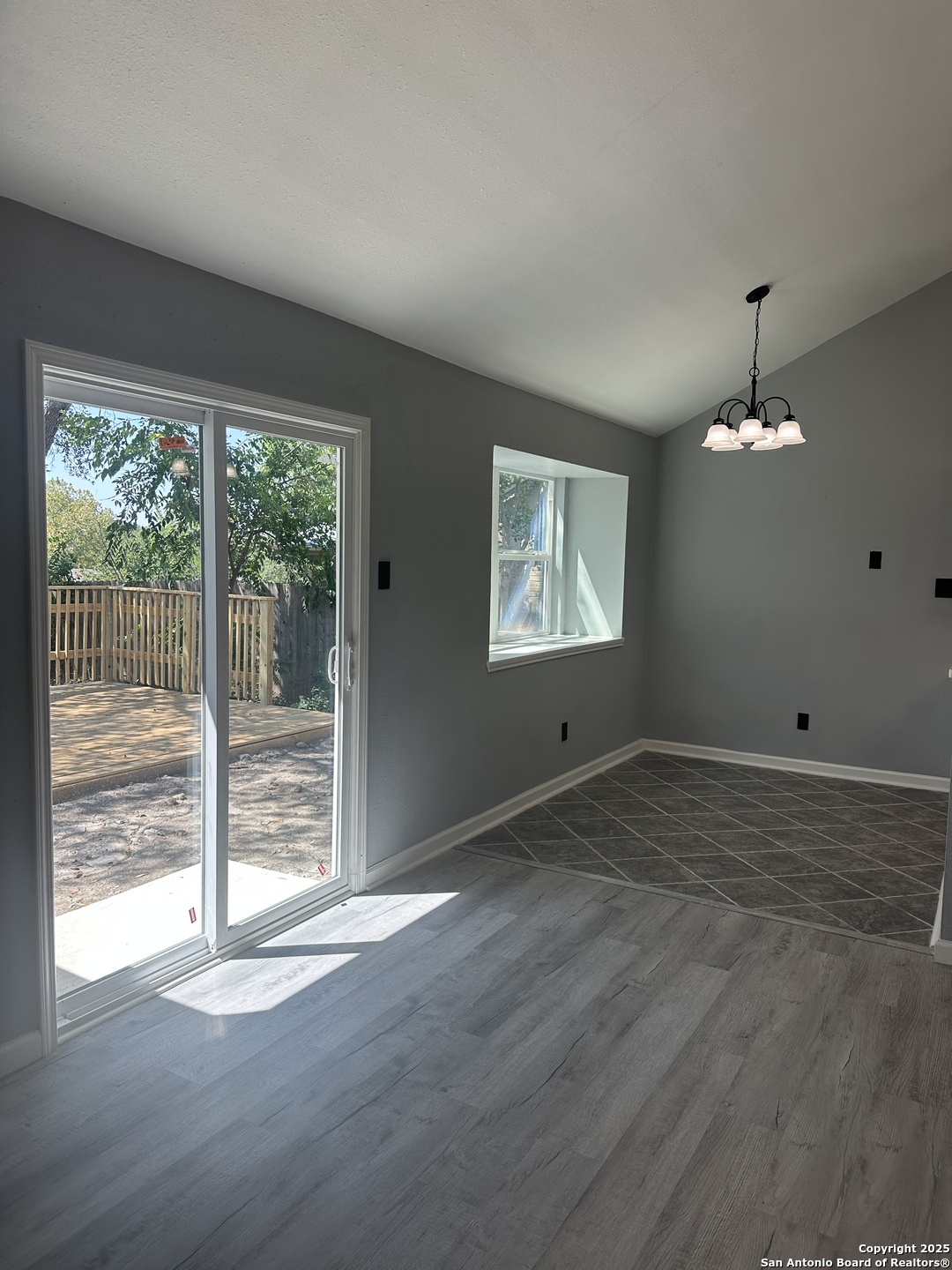 14627 Highland Ridge San Antonio, TX 78233 - Photo 8 of 25 a view of empty room with wooden floor and fan