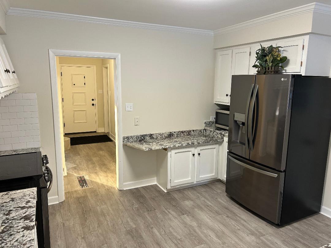 369 North Independence Boulevard Romeoville, IL 60446 - Photo 11 of 36 a kitchen with stainless steel appliances granite countertop a refrigerator and a stove