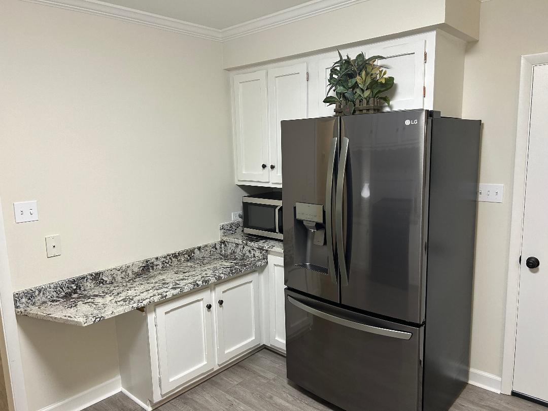 369 North Independence Boulevard Romeoville, IL 60446 - Photo 12 of 36 a kitchen with stainless steel appliances granite countertop a refrigerator and a stove