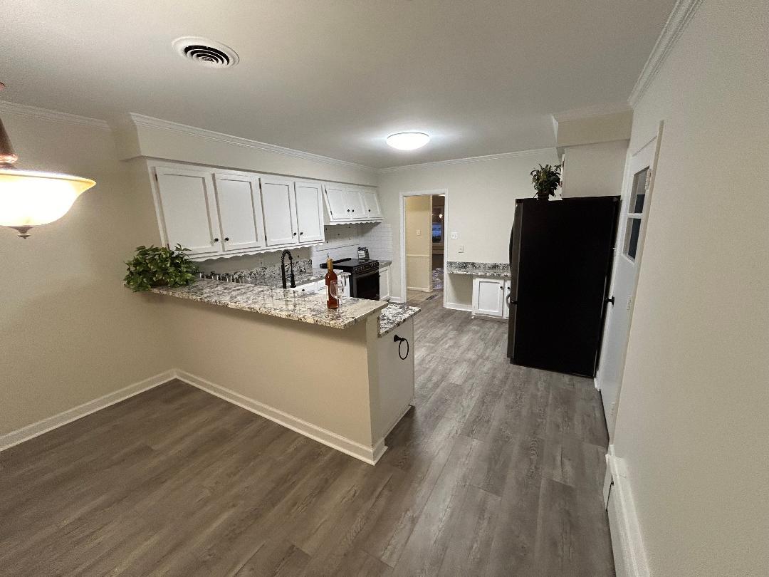 369 North Independence Boulevard Romeoville, IL 60446 - Photo 14 of 36 a kitchen with a refrigerator and a stove top oven