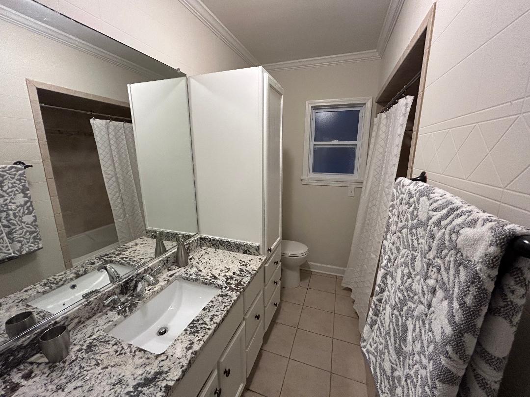 369 North Independence Boulevard Romeoville, IL 60446 - Photo 25 of 36 a bathroom with a granite countertop sink and a mirror