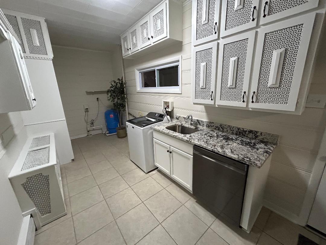 369 North Independence Boulevard Romeoville, IL 60446 - Photo 28 of 36 a kitchen with a stove a sink and a refrigerator