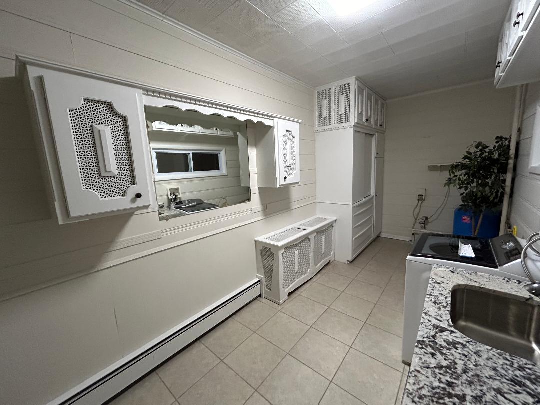 369 North Independence Boulevard Romeoville, IL 60446 - Photo 29 of 36 a room with a couch and a stove top oven