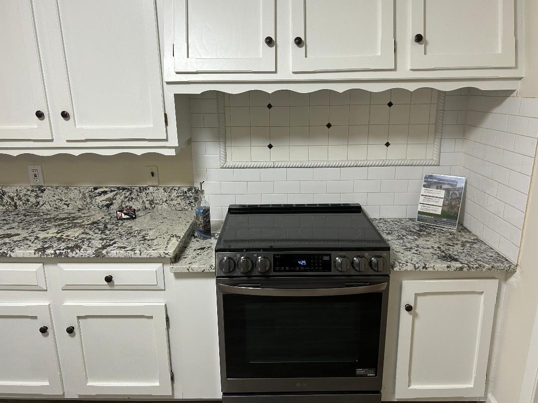 369 North Independence Boulevard Romeoville, IL 60446 - Photo 5 of 36 a stove top oven sitting inside of a kitchen