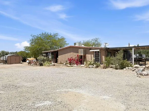 front view of a house with a patio