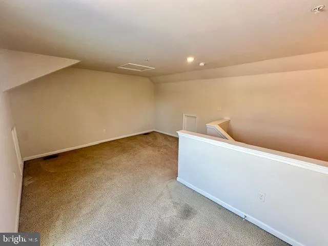 a view of a room with an empty space