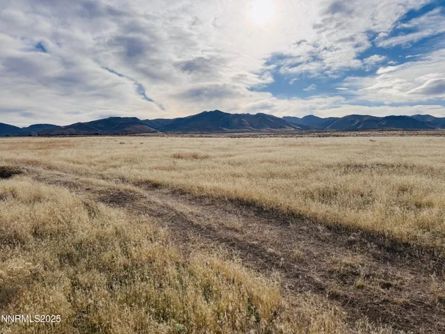 a view of lake and mountain