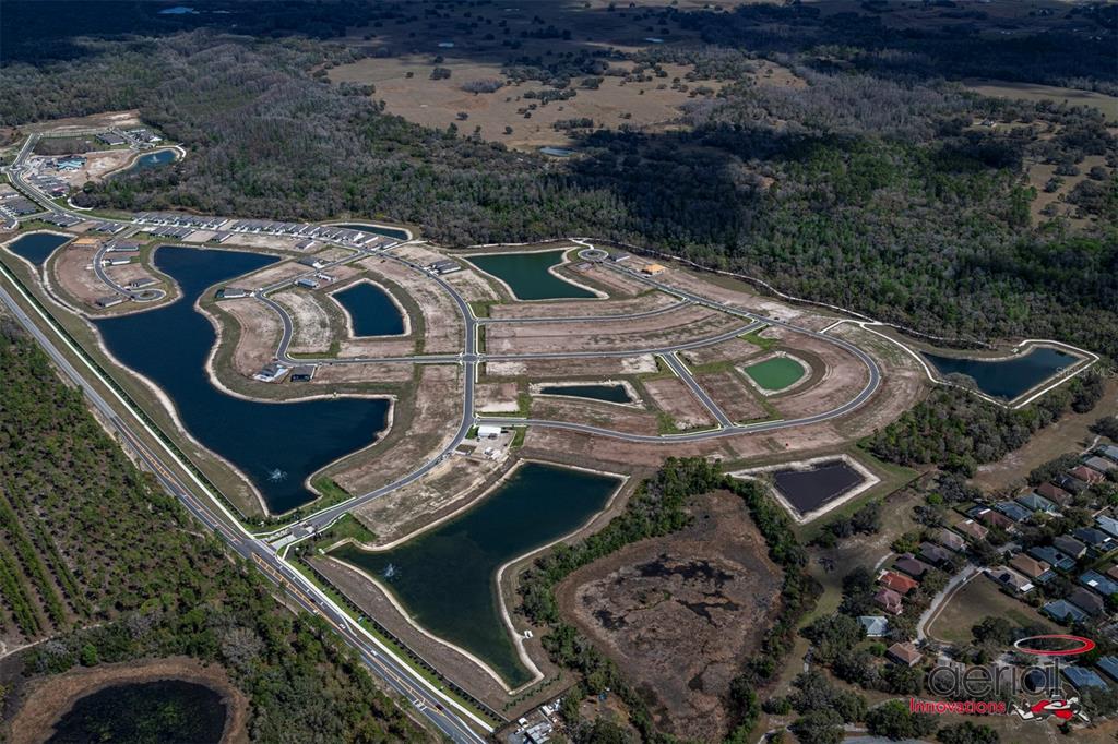 13693 Cyn Rdg Road Spring Hill, FL 34610 - Photo 28 of 29 an aerial view of houses with outdoor space