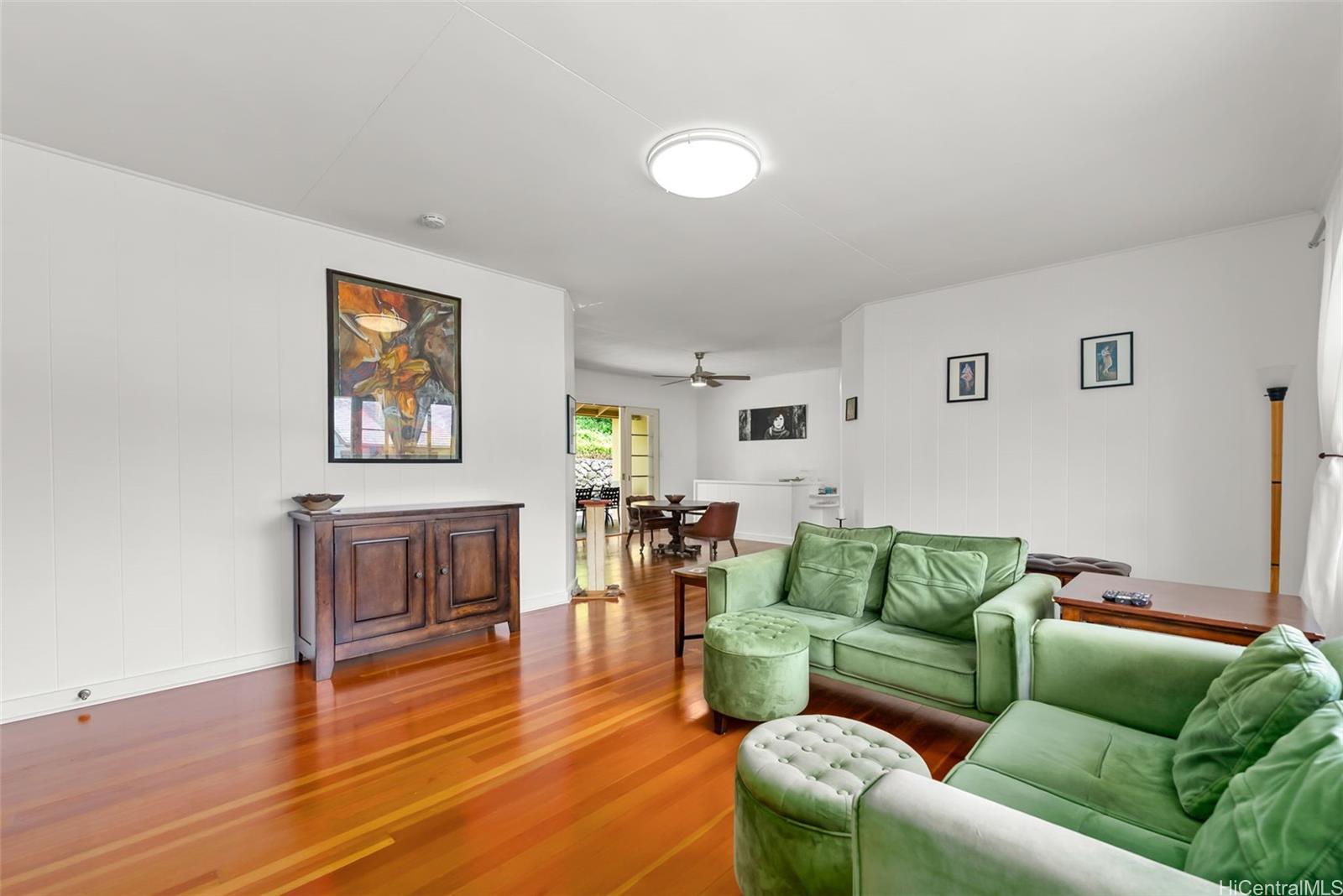 2811 Henry Street Honolulu, HI 96817 - Photo 4 of 25 Seamlessly connected, the living and dining areas create a harmonious flow that is perfect for both daily life and hosting gatherings.