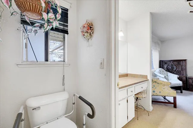 a bathroom with a sink a toilet and a bathtub