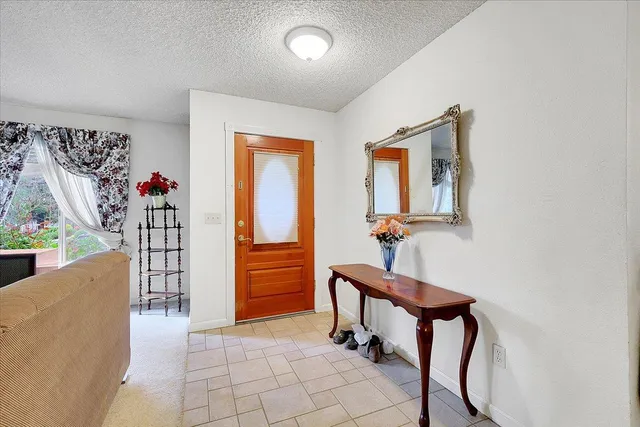 a room with furniture and a window