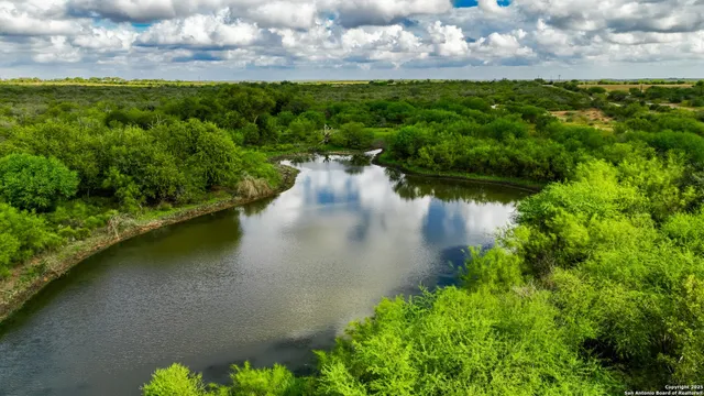 a view of a lake with a city