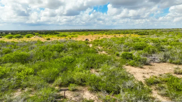 a view of yard with swimming pool and outdoor space
