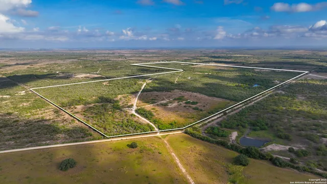 a view of an outdoor space and tennis court
