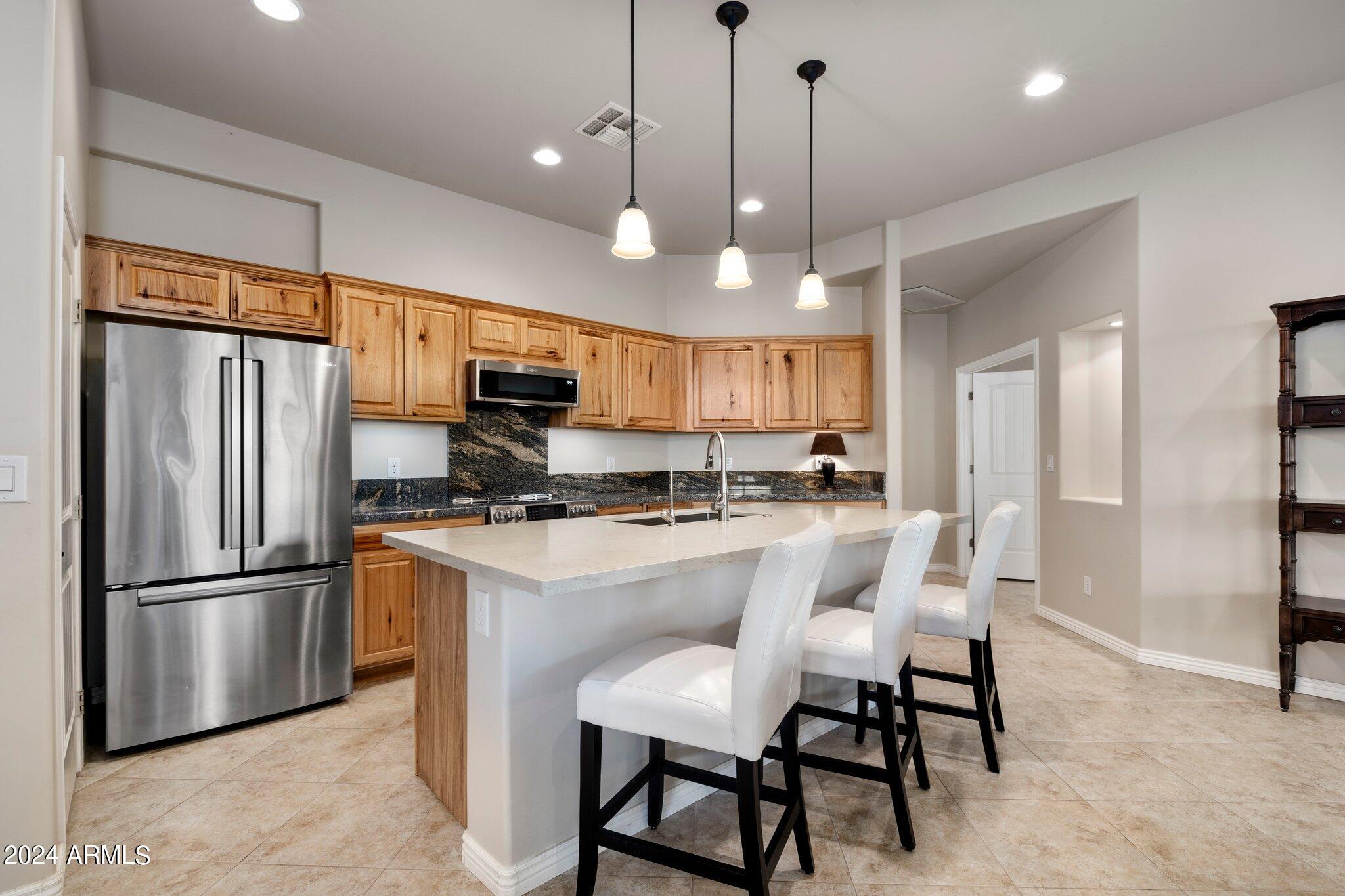 1632 South Barkley Road Apache Junction, AZ 85119 - Photo 8 of 24 Kitchen with Stainless Steel Appliances