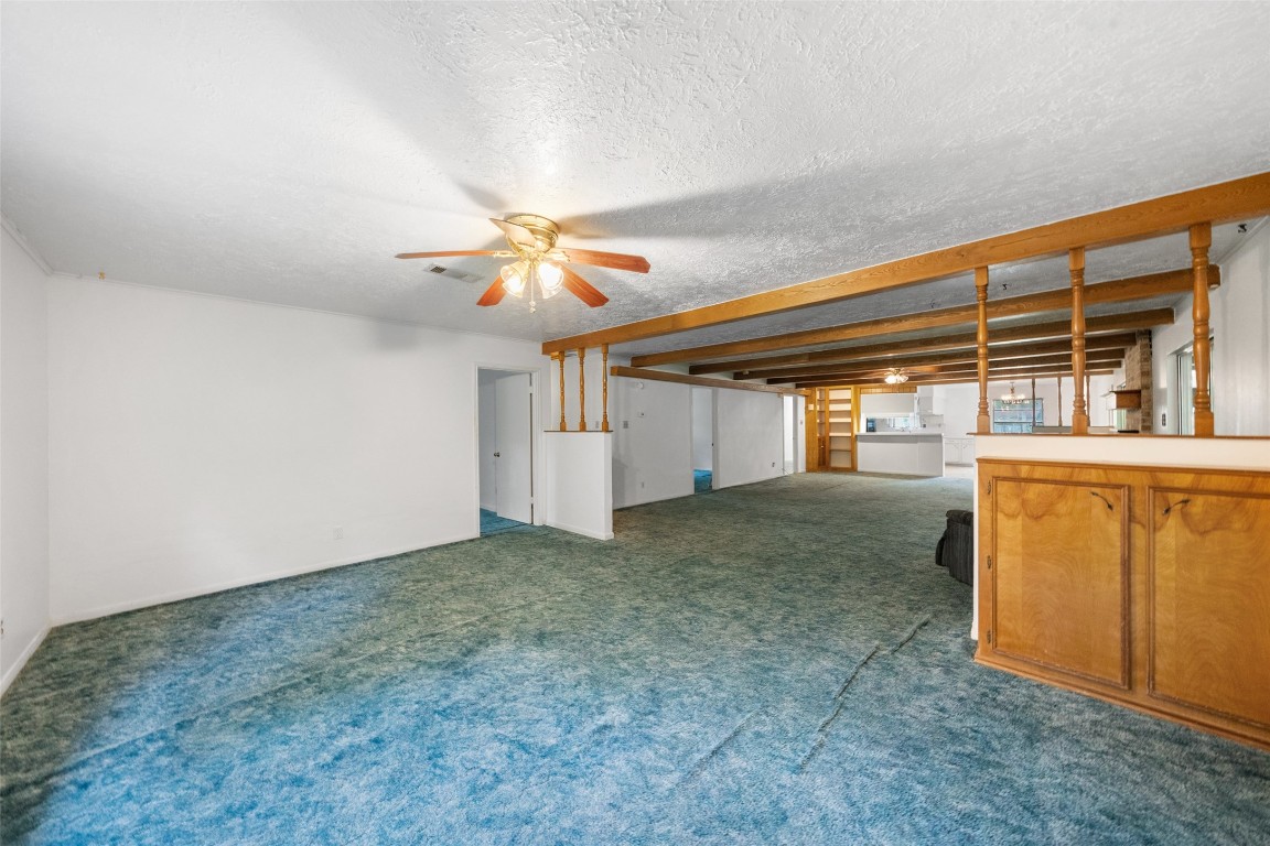 101 Walnut Coldspring, TX 77331 - Photo 15 of 37 an empty room with windows