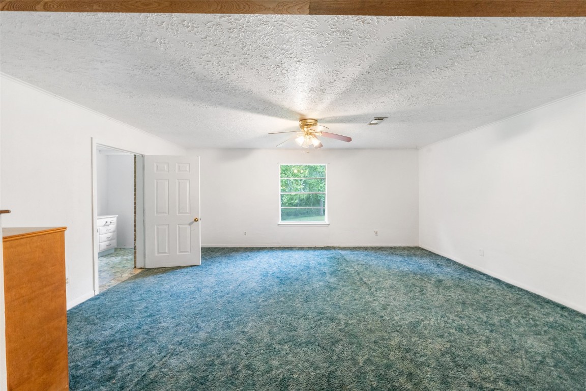 101 Walnut Coldspring, TX 77331 - Photo 16 of 37 an empty room with a window