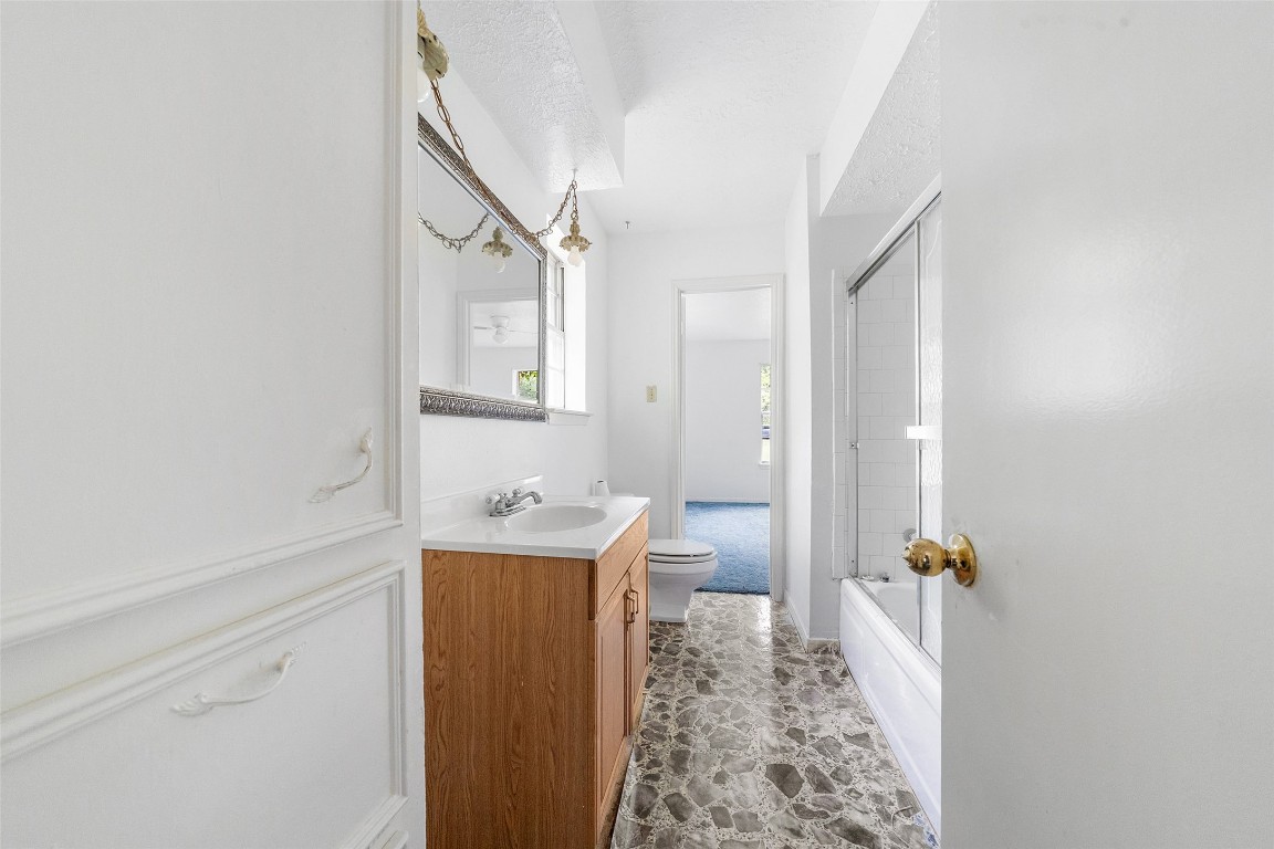 101 Walnut Coldspring, TX 77331 - Photo 22 of 37 a bathroom with a sink a toilet and shower