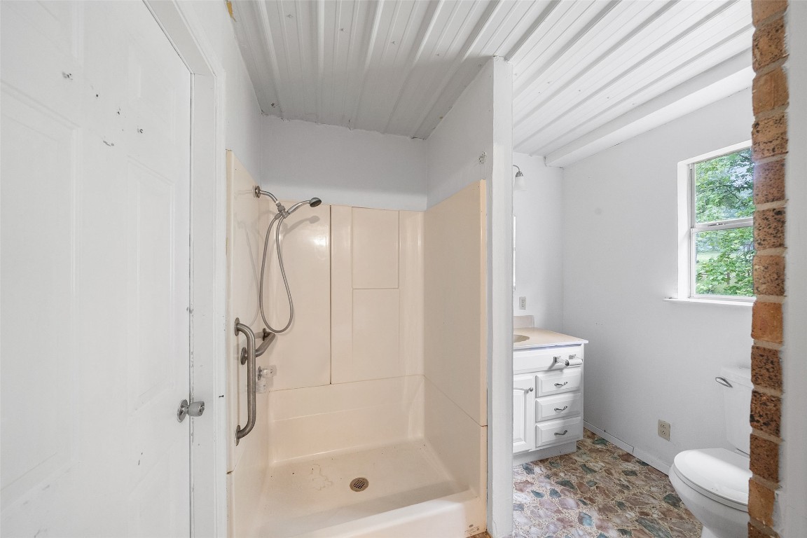 101 Walnut Coldspring, TX 77331 - Photo 24 of 37 a bathroom with a shower