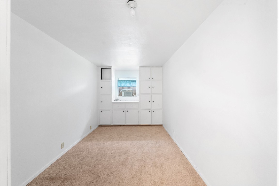 101 Walnut Coldspring, TX 77331 - Photo 25 of 37 a view of an empty room with a window
