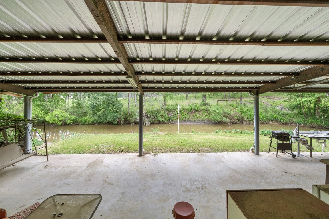 101 Walnut Coldspring, TX 77331 - Photo 28 of 37 a house view with a garden