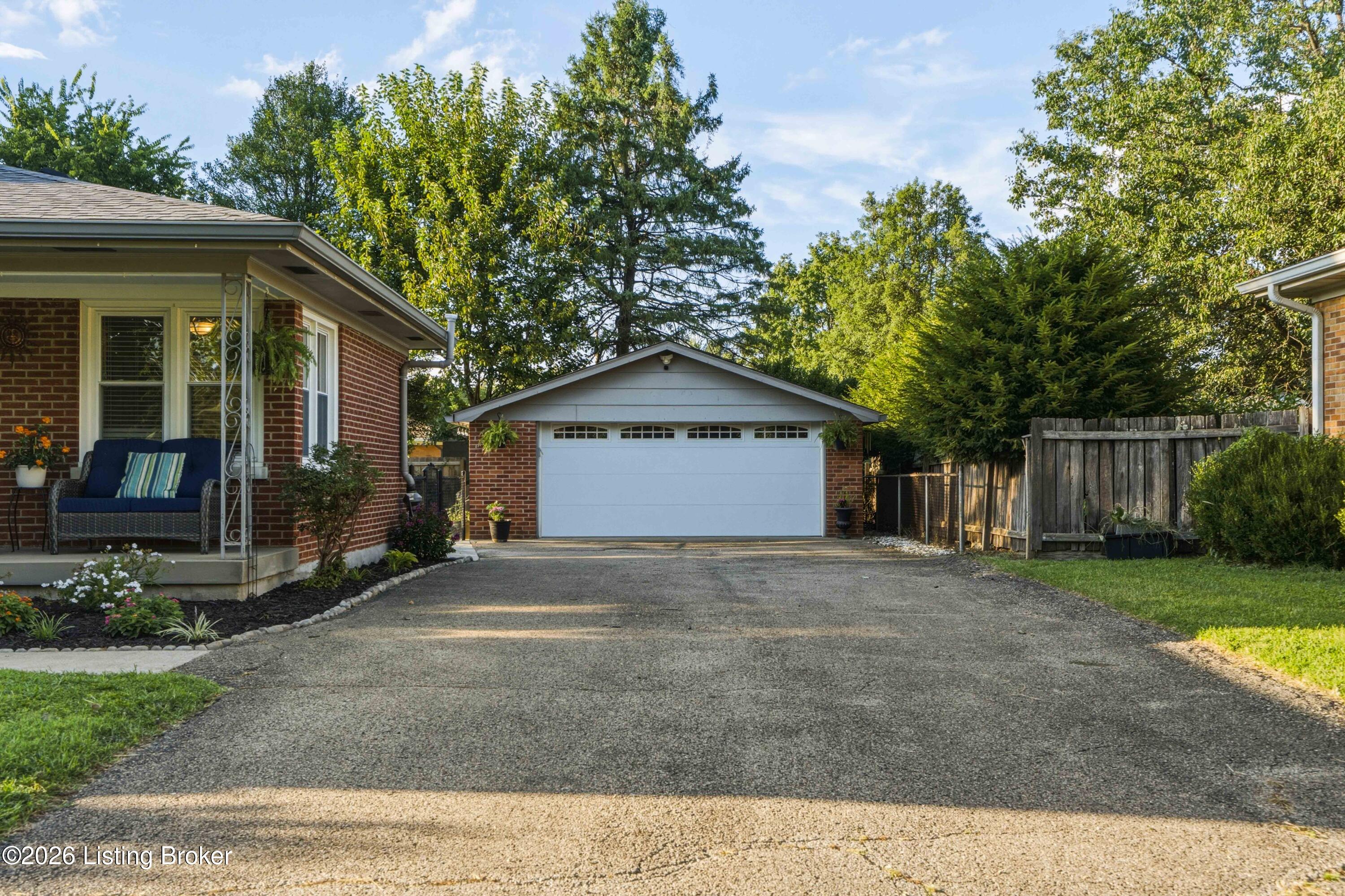 8811 Waltlee Road Louisville, KY 40291 - Photo 9 of 42 09-Driveway-Garage