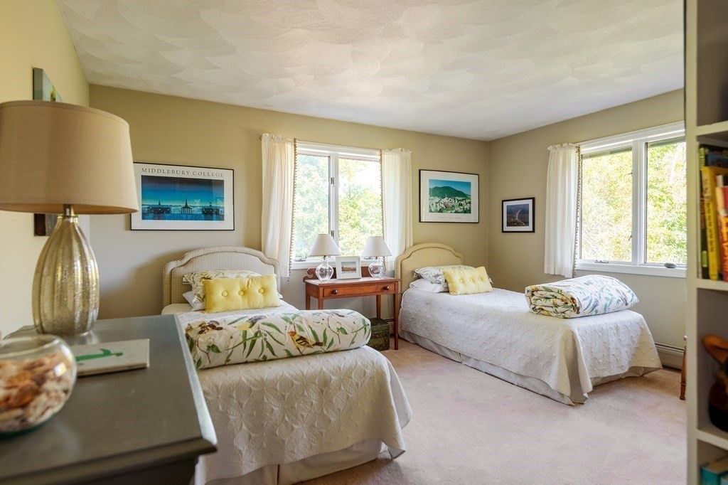 239 Argilla Road Ipswich, MA 01938 - Photo 17 of 37 a bedroom with two beds and a window