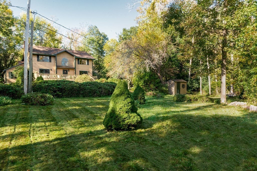 239 Argilla Road Ipswich, MA 01938 - Photo 24 of 37 a front view of a house with a yard