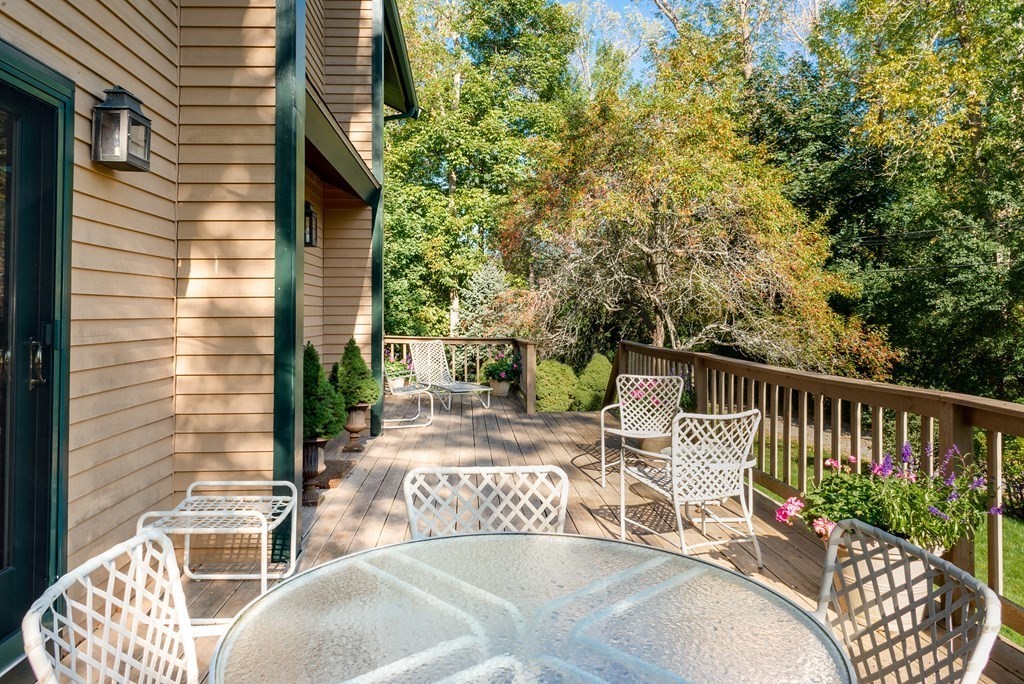 239 Argilla Road Ipswich, MA 01938 - Photo 27 of 37 a view of balcony with wooden floor and outdoor seating