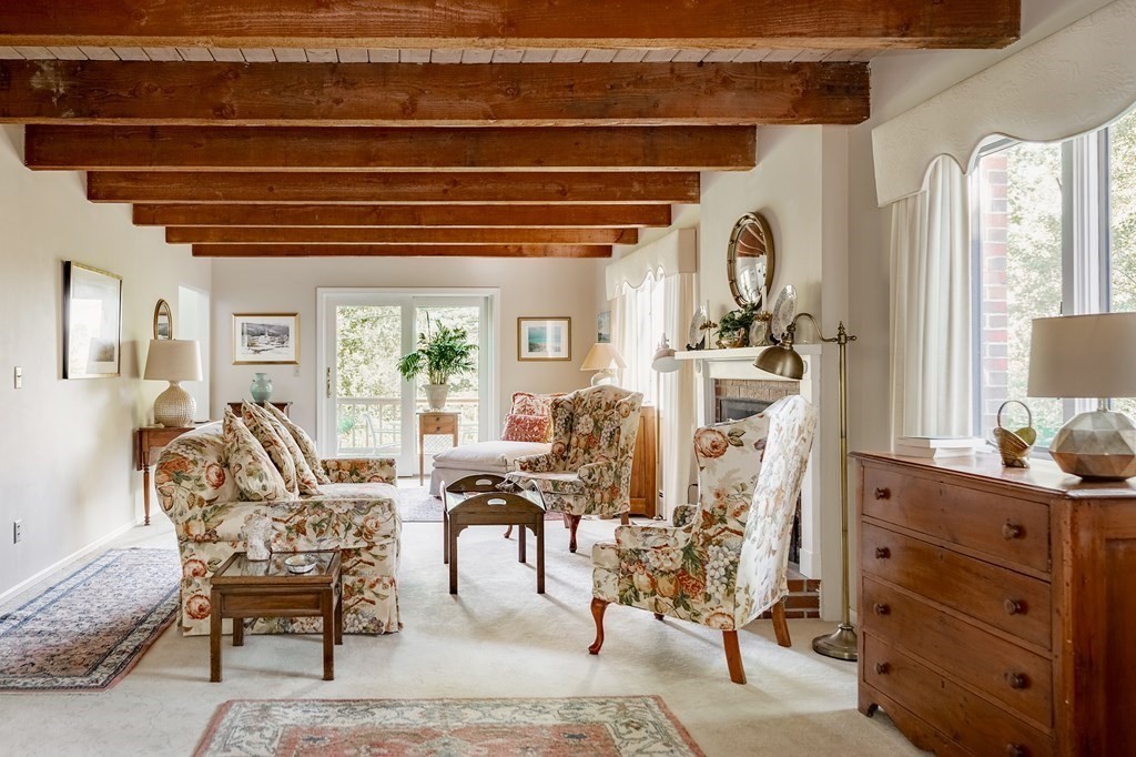 239 Argilla Road Ipswich, MA 01938 - Photo 5 of 37 a view of a livingroom with furniture and a potted plant