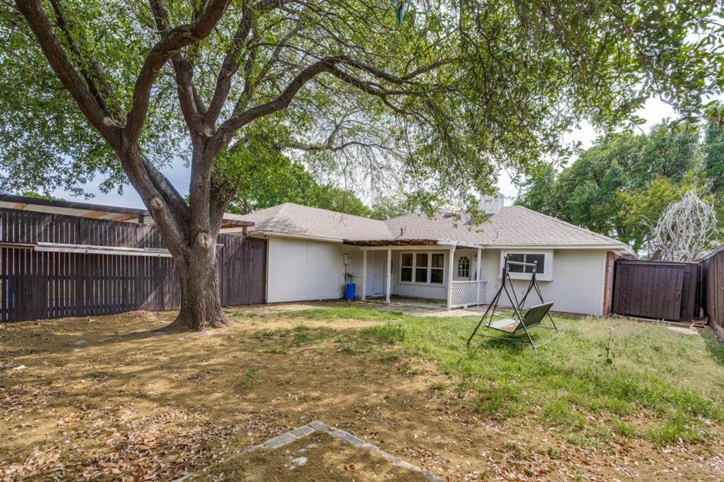 1509 Clover Drive Allen, TX 75002 - Photo 25 of 25 a house with trees in the background