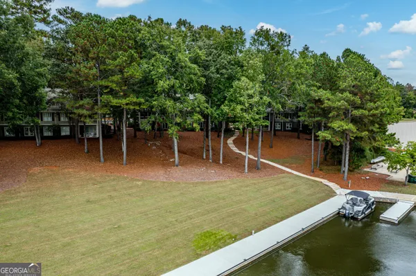 a view of a swimming pool with a patio