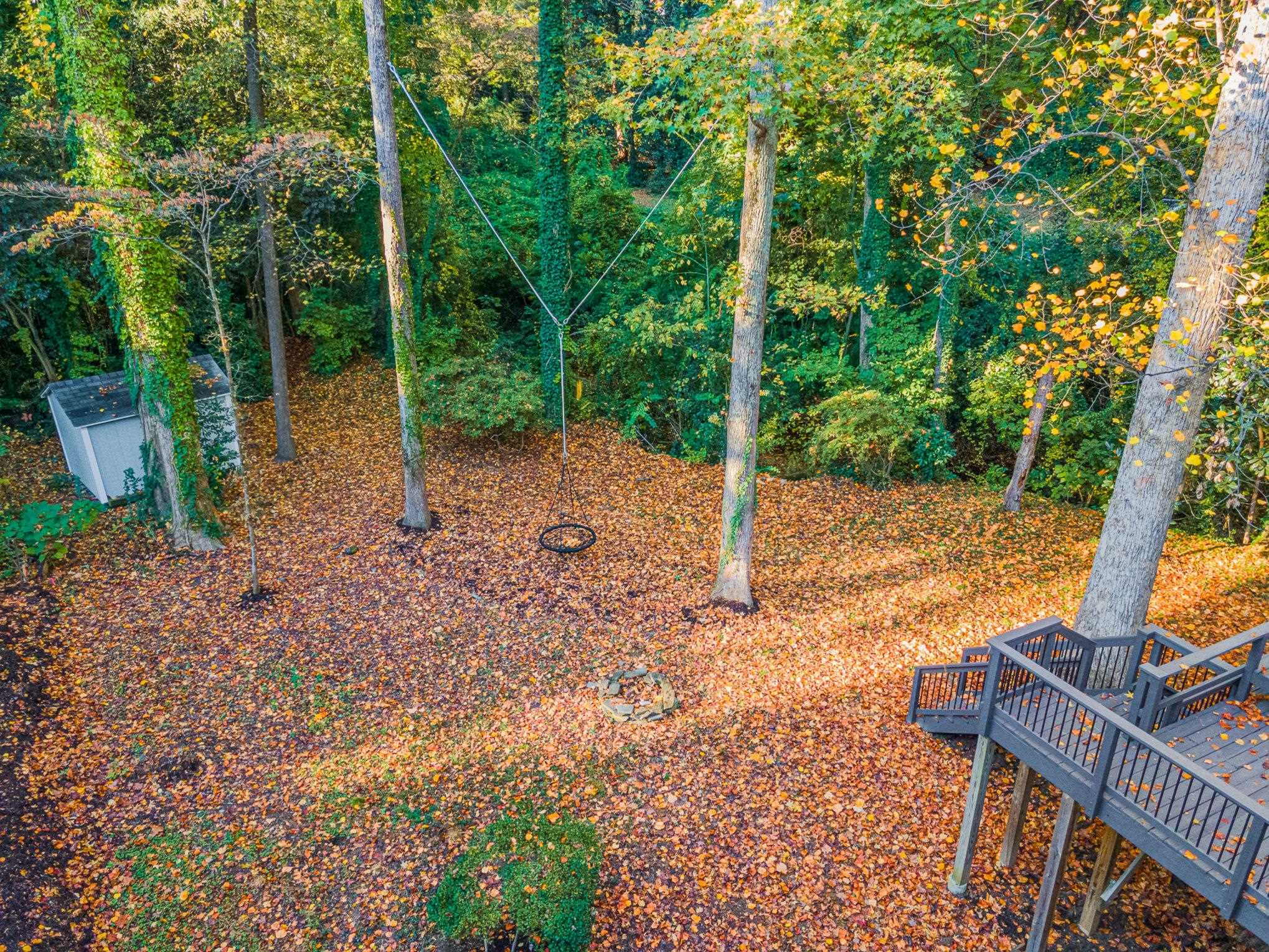 2811 Gordon Street Raleigh, NC 27608 - Photo 13 of 33 a view of a backyard with sitting area