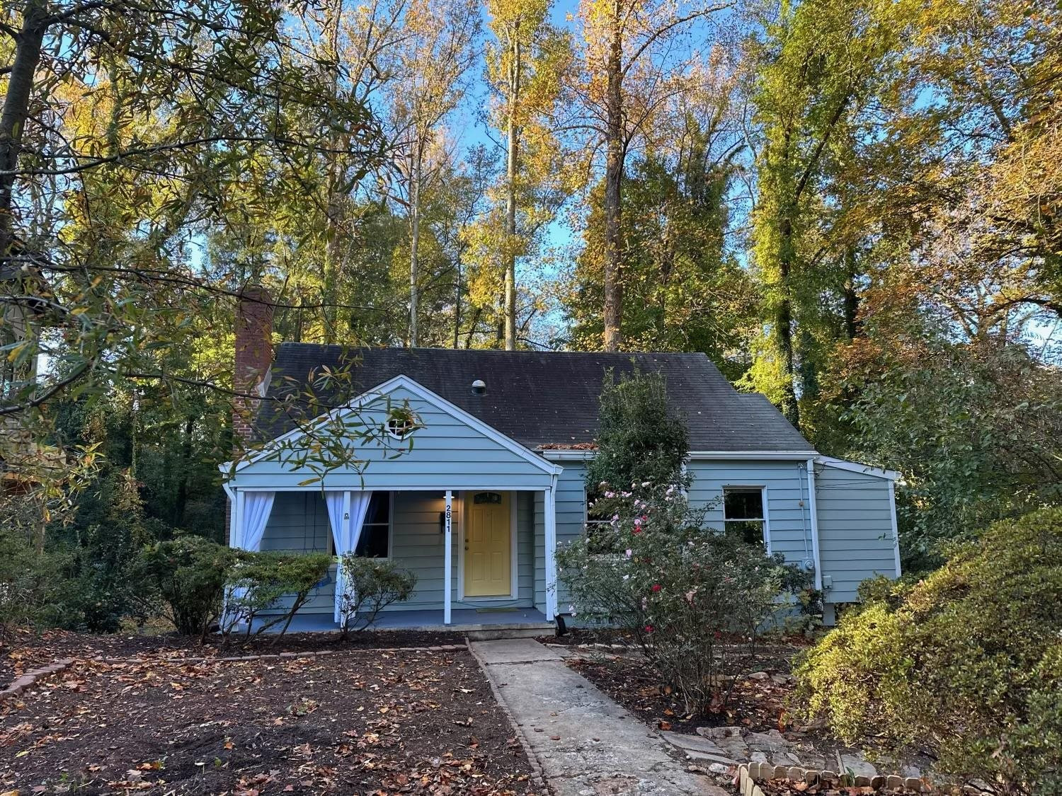 2811 Gordon Street Raleigh, NC 27608 - Photo 2 of 33 a front view of a house with garden