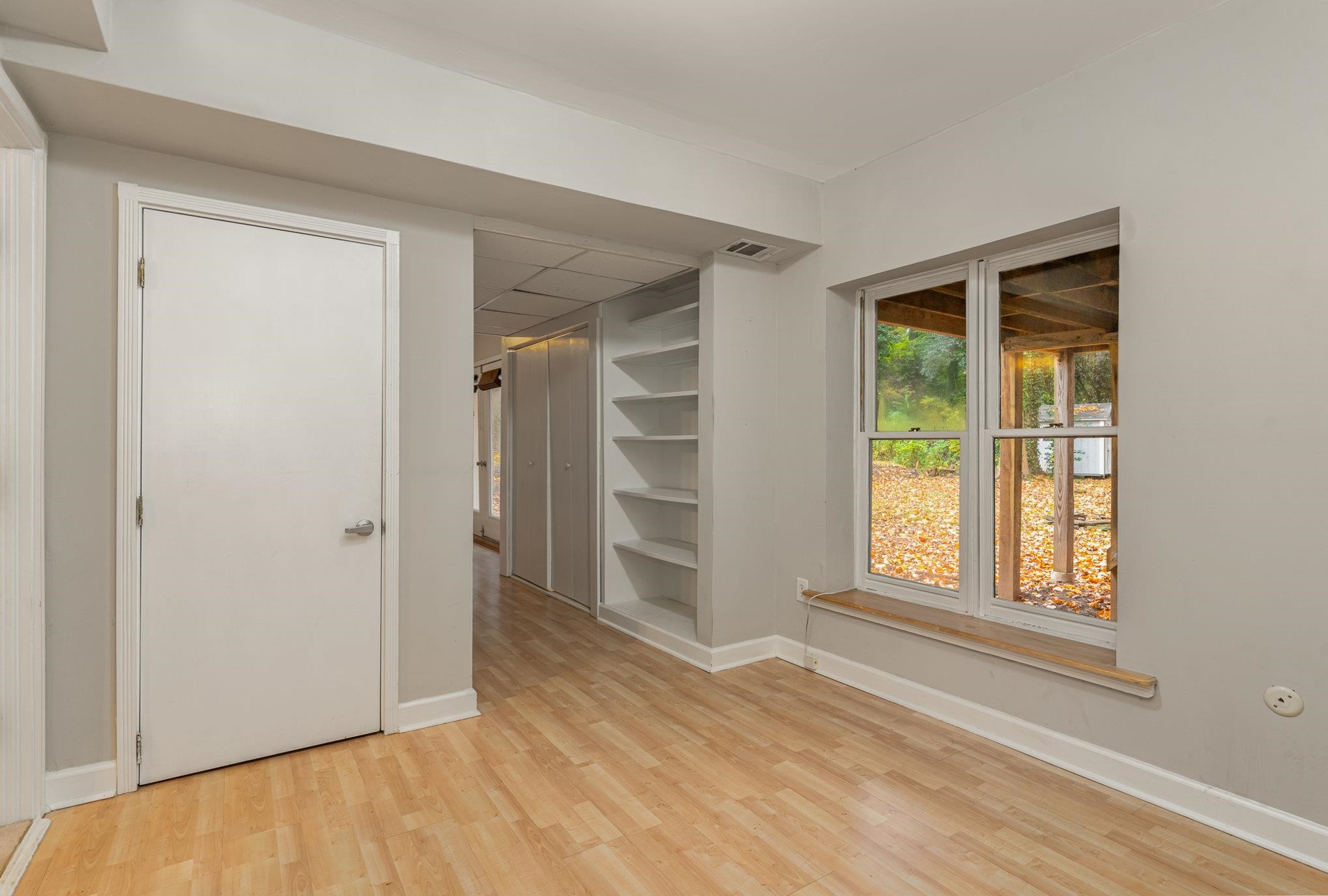 2811 Gordon Street Raleigh, NC 27608 - Photo 27 of 33 a view of an empty room with a window