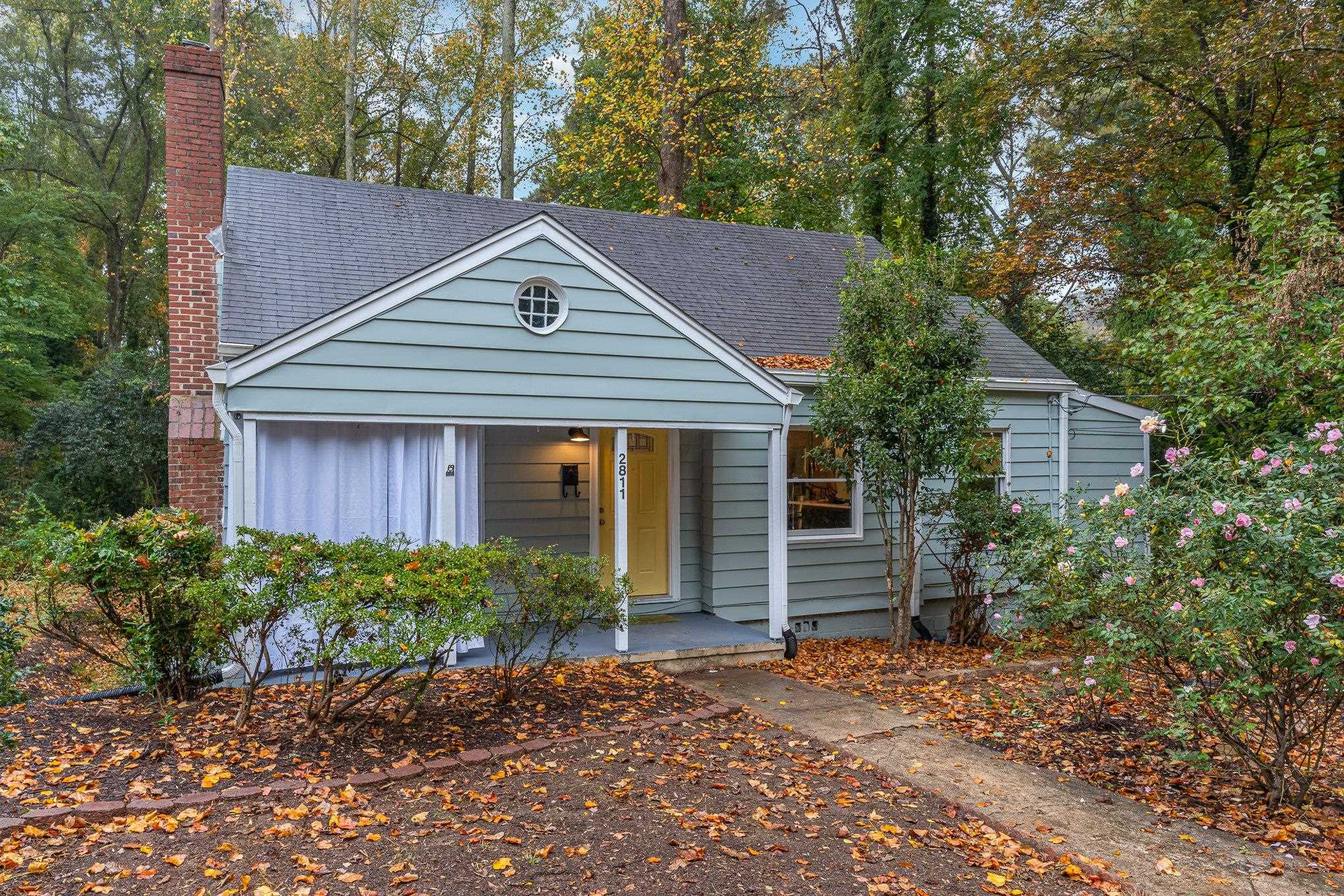 2811 Gordon Street Raleigh, NC 27608 - Photo 3 of 33 a front view of a house with garden