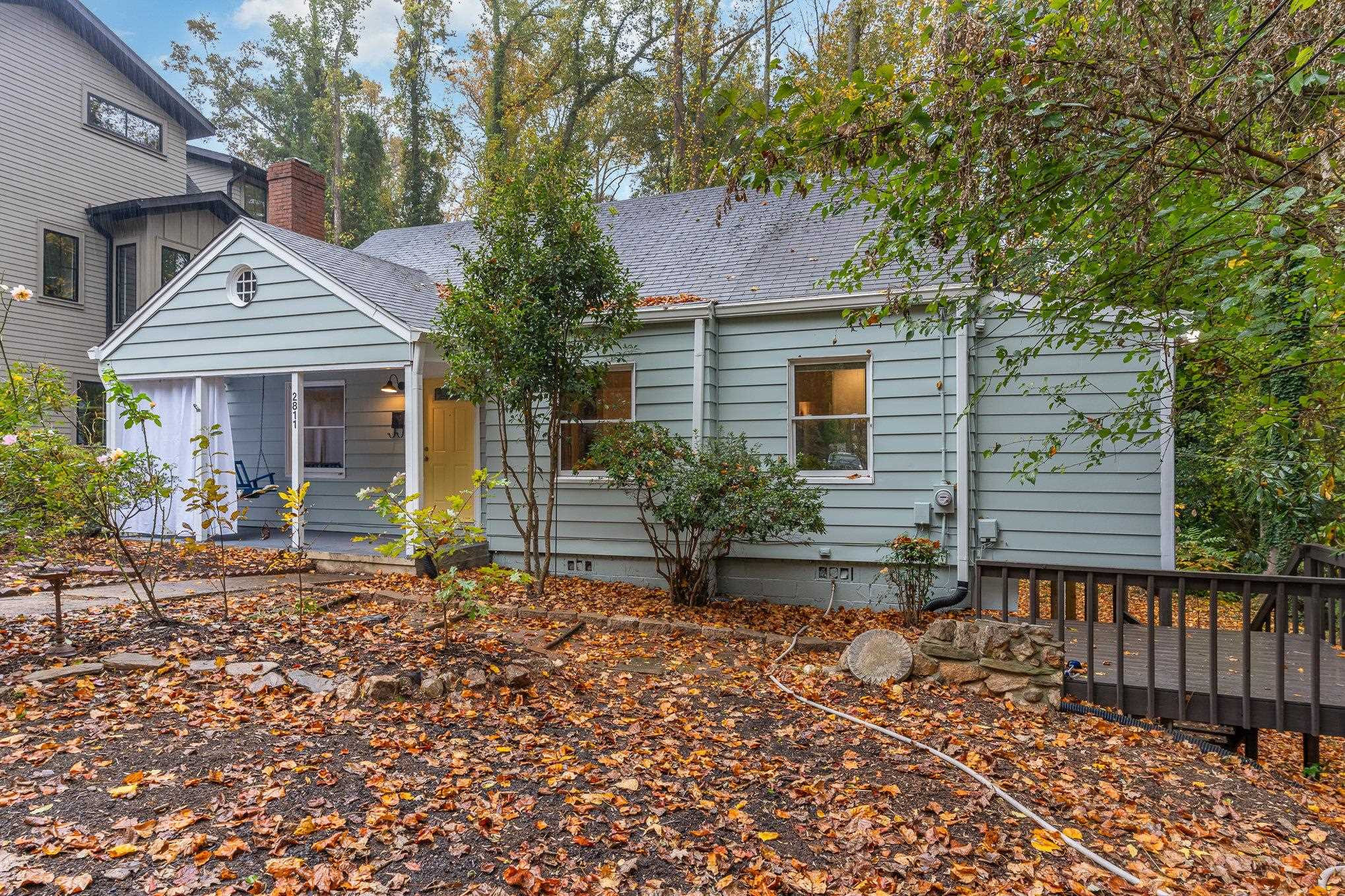 2811 Gordon Street Raleigh, NC 27608 - Photo 7 of 33 a front view of a house with garden