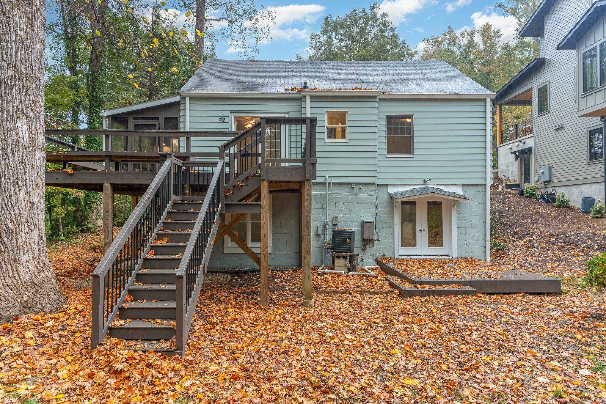2811 Gordon Street Raleigh, NC 27608 - Photo 8 of 33 a front view of a house with a yard